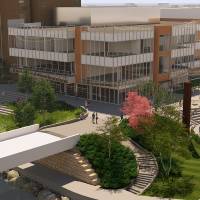 View from Blue Bridge of Building Exterior - NE Riverside